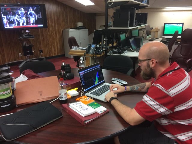 Colby Working at an OU Game