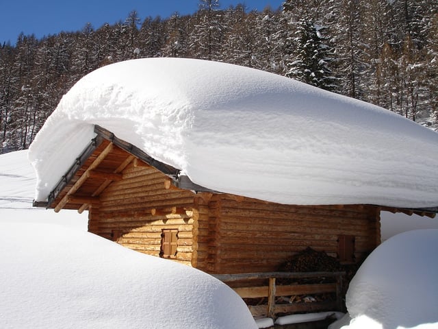 Snow Accumulated on Cabin Roof